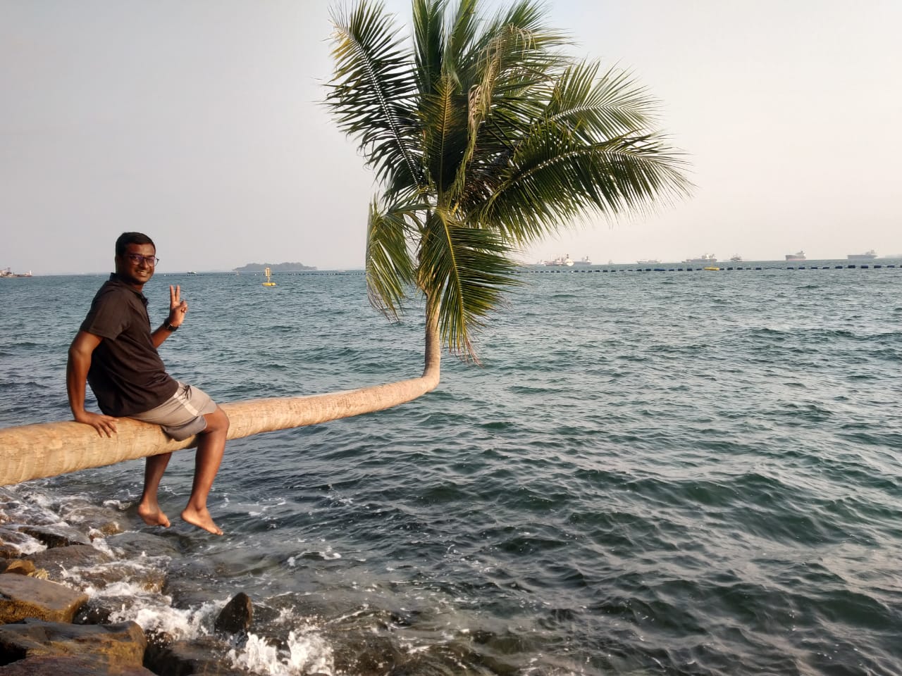 Karthik while on his trip at Singapore